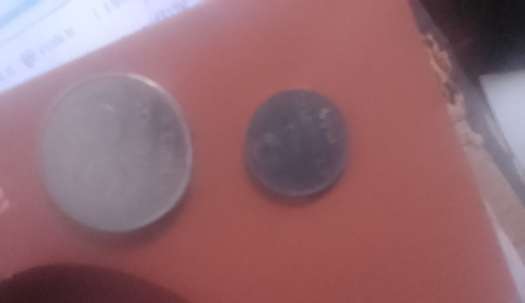 Vendo duas moedas antigas:Uma  de 50 cruzeiro e uma de 2 centavos.